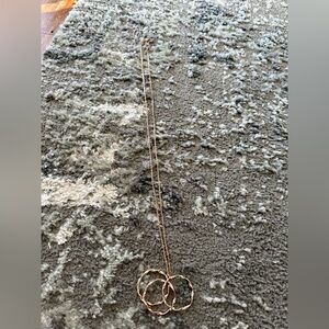 Long gold necklace